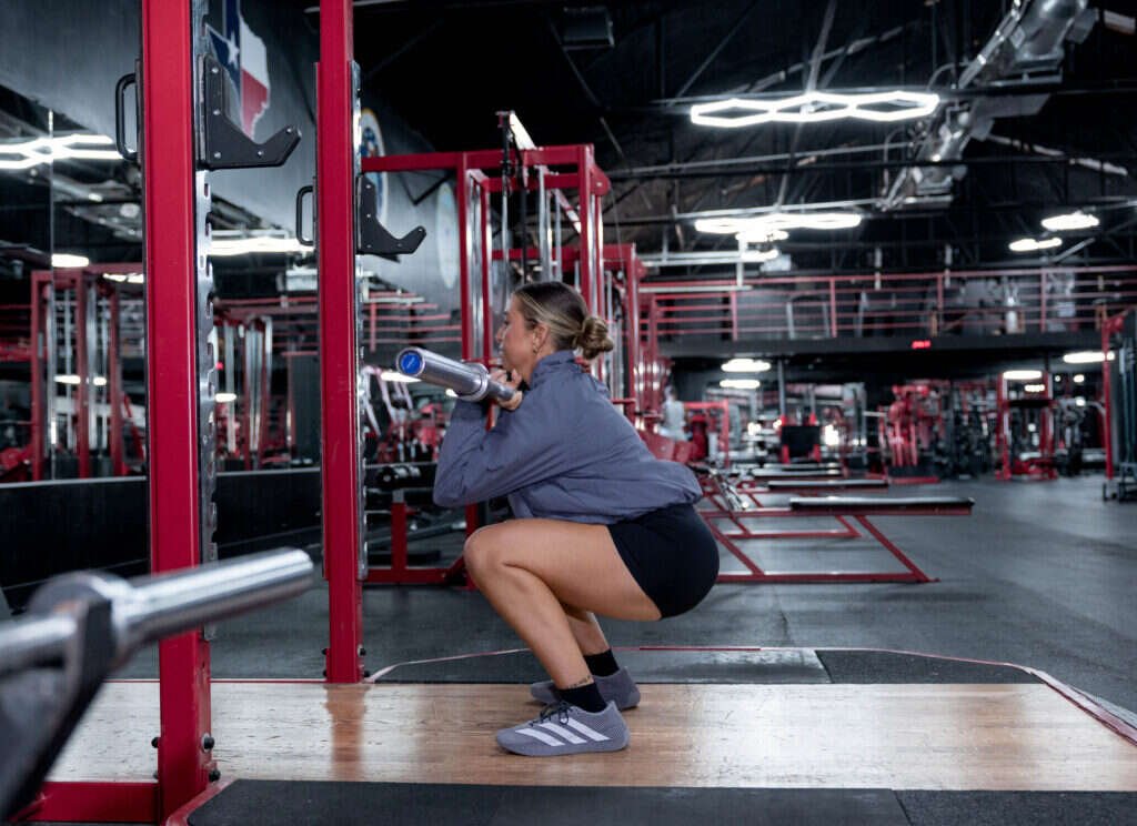 Landmine squat at the private Gryffon Performance training studio in Dallas