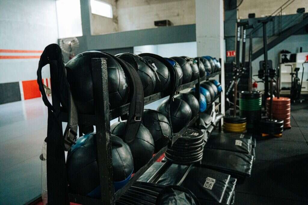 Well-equipped private training studio with kettlebells and weights